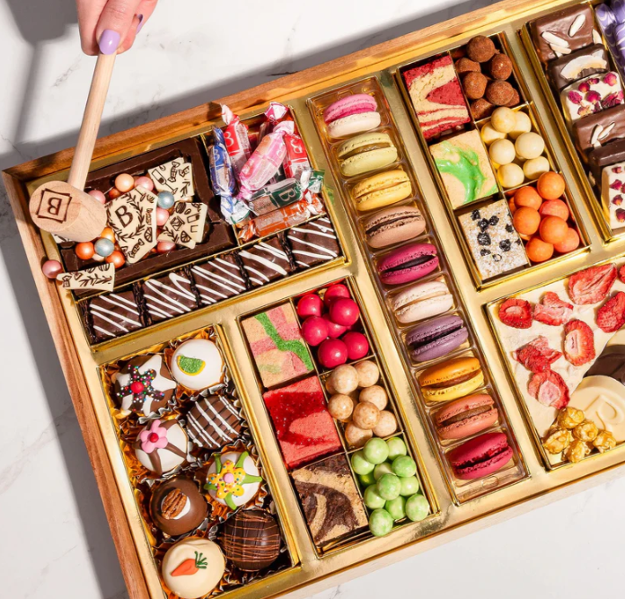 boarderie boxes can be sweet, savory, or a little bit of both. sure to satisfy any client's cravings